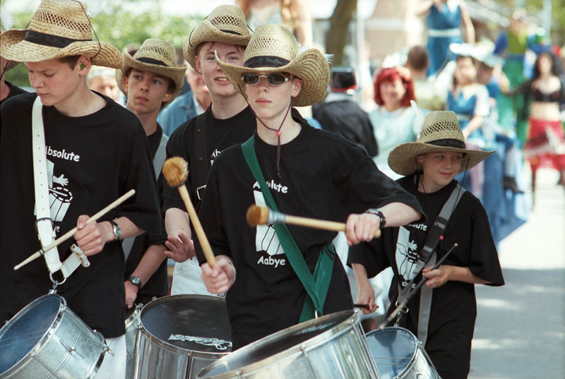 Peter drumming in parade, Copenhagen, Denmark