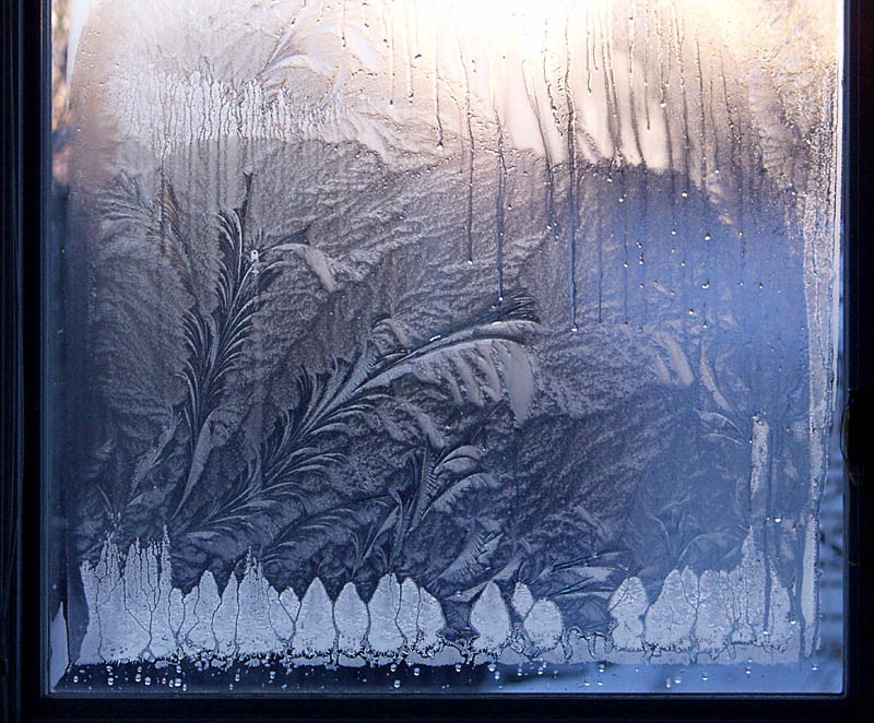 Frost Gnomes on Window after sunset